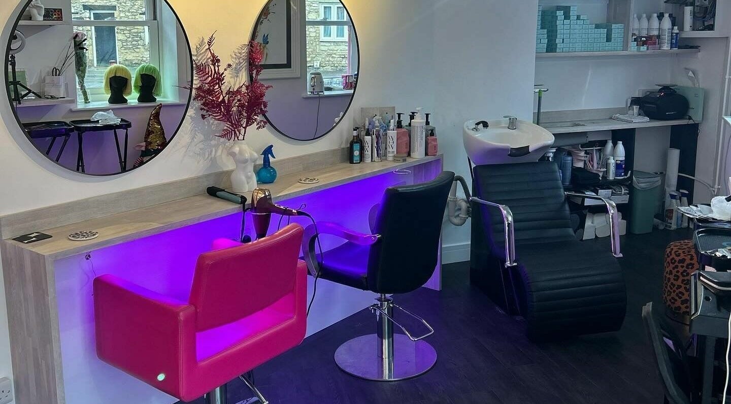 Chic salon chairs and styling stations at The Look Wheatley Edition in Wheatley, England, GB.
