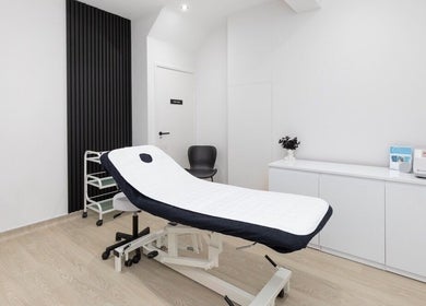 Modern treatment room at 360 Hair Clinic in Brighton And Hove, England, GB with sleek design and comfortable bed.