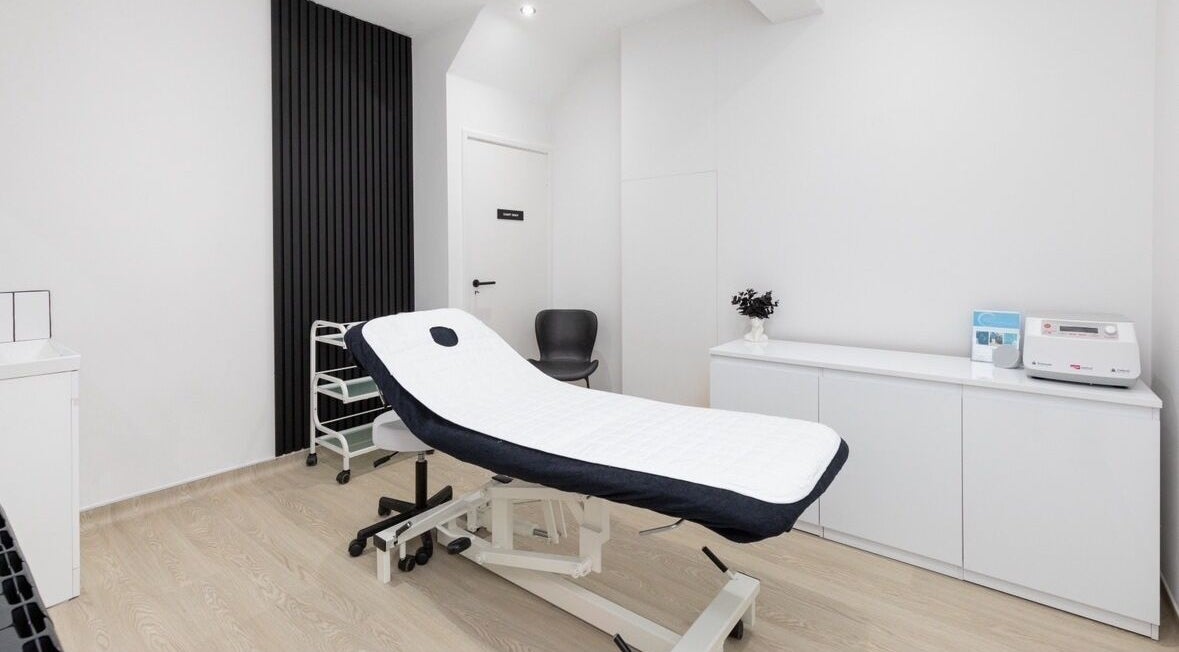 Modern treatment room in 360 Hair Clinic, Brighton And Hove, England, GB. Features reclining chair and sleek decor.