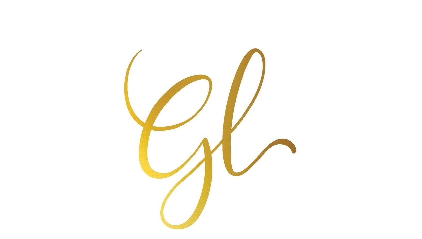 Stylish golden logo of G L Aesthetics in Tynemouth, England, GB, symbolizing luxury in beauty and wellness.