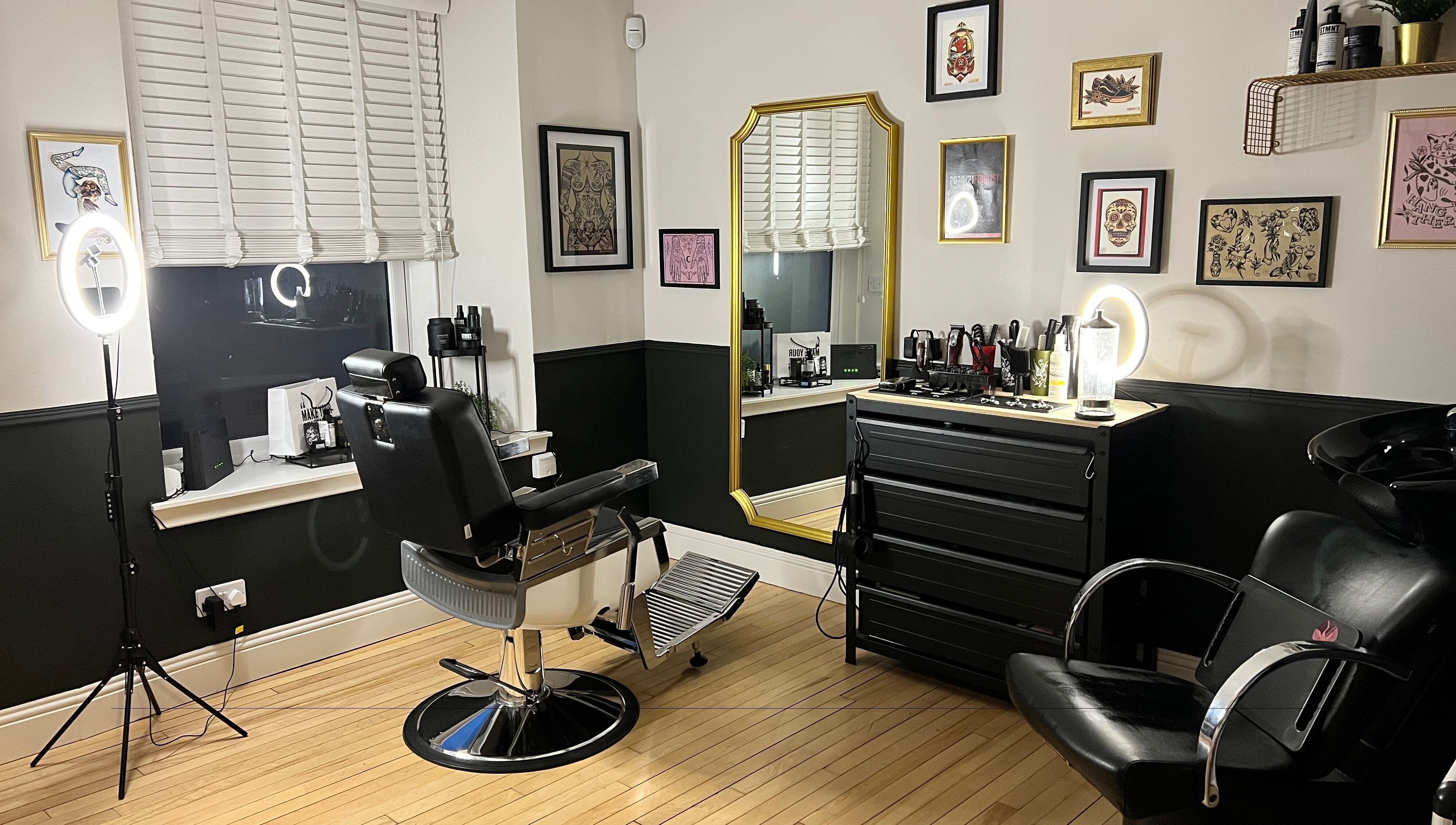Stylish barber room at New Street Collective, Bridge Of Allan, Scotland, featuring elegant decor and modern amenities.