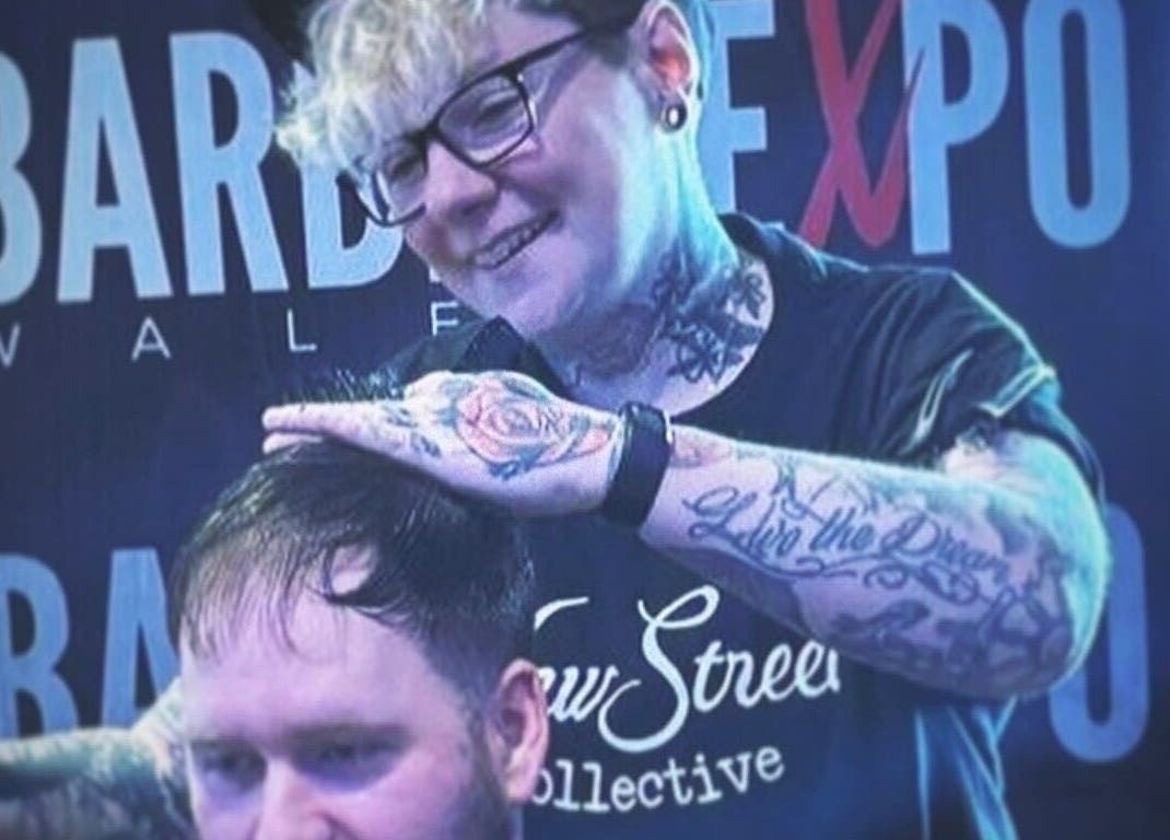 A skilled barber at New Street Collective offers a haircut at Bridge Of Allan, Scotland, GB.