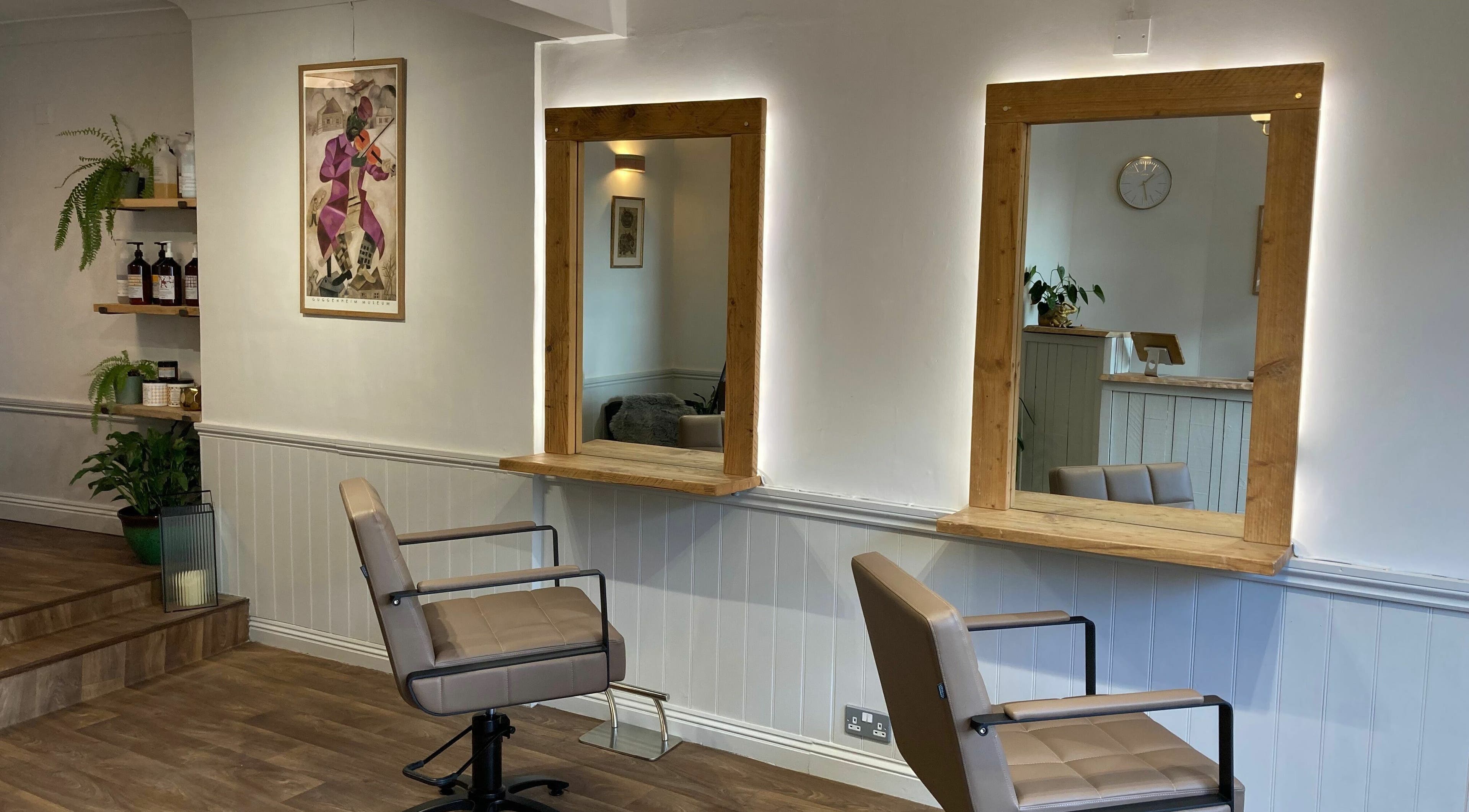 Modern and cozy salon interior at Chavela Mora Hairstyling, Wincanton, England, GB.