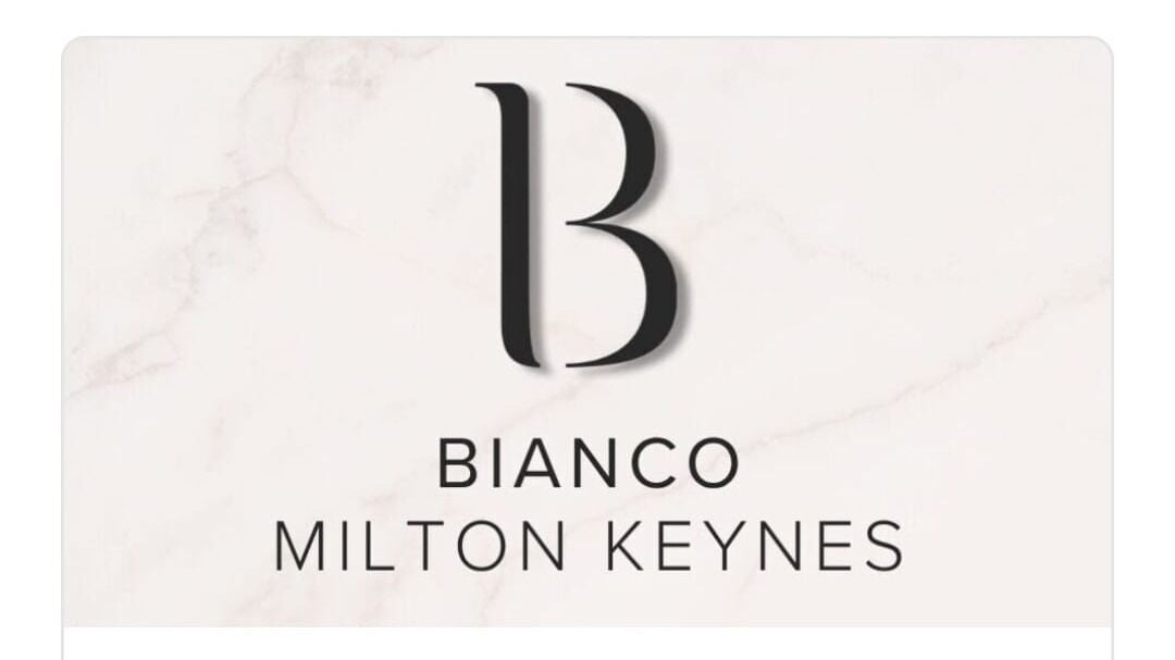 Bianco Beauty Milton Keynes logo on marble background, Milton Keynes, England, GB.