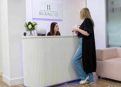 Reception area at Bianco Beauty Milton Keynes, Milton Keynes, England, GB with a client and staff.