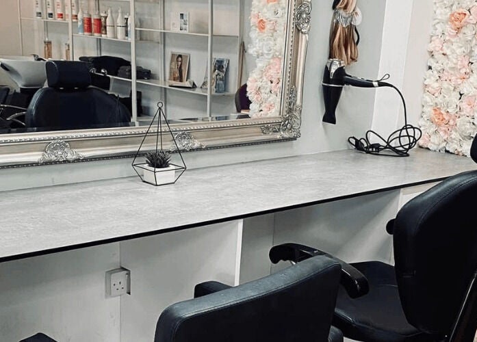 Elegant styling station at Thirty-Eight, Washington, England, GB with floral decor and modern seating.