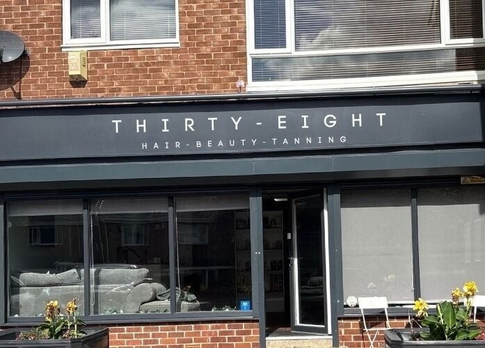 Exterior of Thirty-Eight beauty salon in Washington, England, GB, showcasing its stylish storefront design.