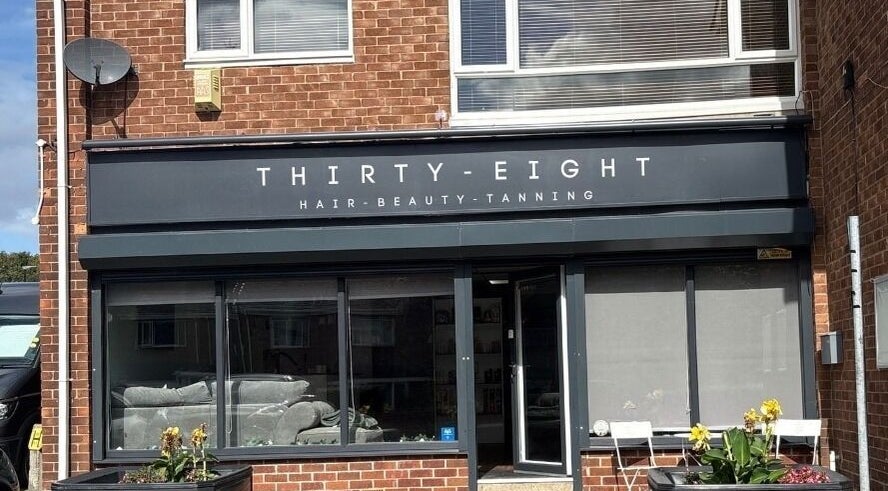 Exterior of Thirty-Eight beauty salon in Washington, England, GB, showcasing its stylish storefront design.