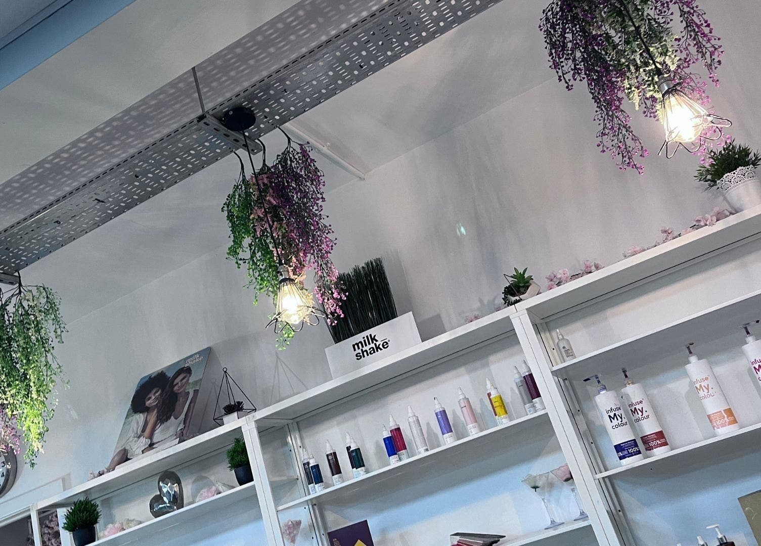 Hanging lights and product shelves at Thirty-Eight, Washington, England, GB, showcasing vibrant decor.