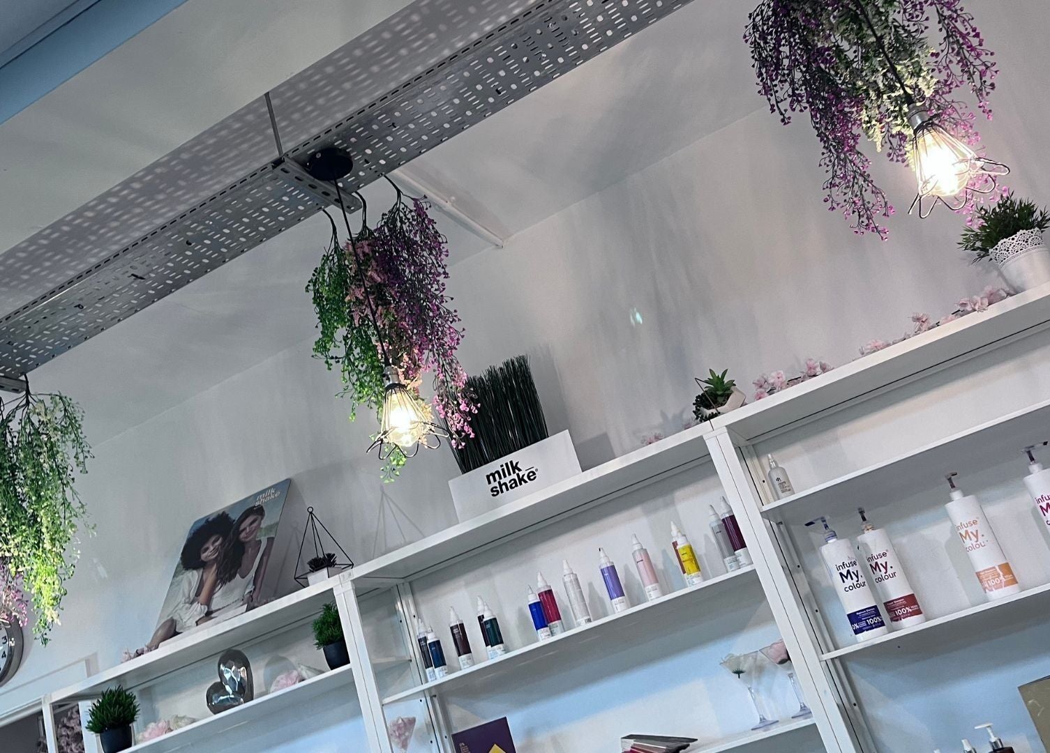 Hanging lights and product shelves at Thirty-Eight, Washington, England, GB, showcasing vibrant decor.