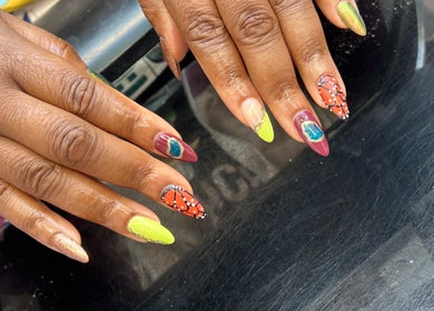 Unique nail art at Amelia Boutique, Carlton In Lindrick, England, GB, showcasing vibrant and detailed designs.
