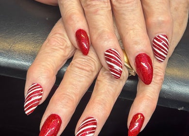 Festive red and white nail art at Amelia boutique, Carlton In Lindrick, England, GB.