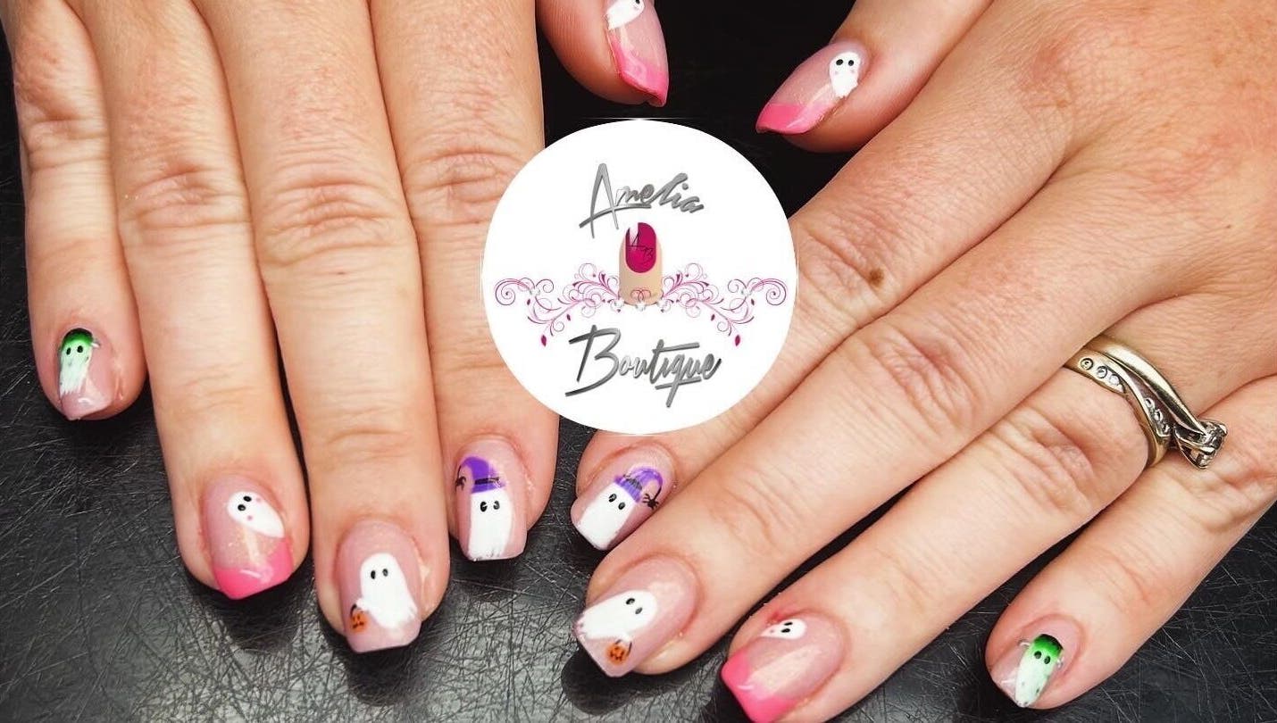 Stylish Halloween nail art at Amelia Boutique, Carlton In Lindrick, England, GB. Unique ghost designs showcased.