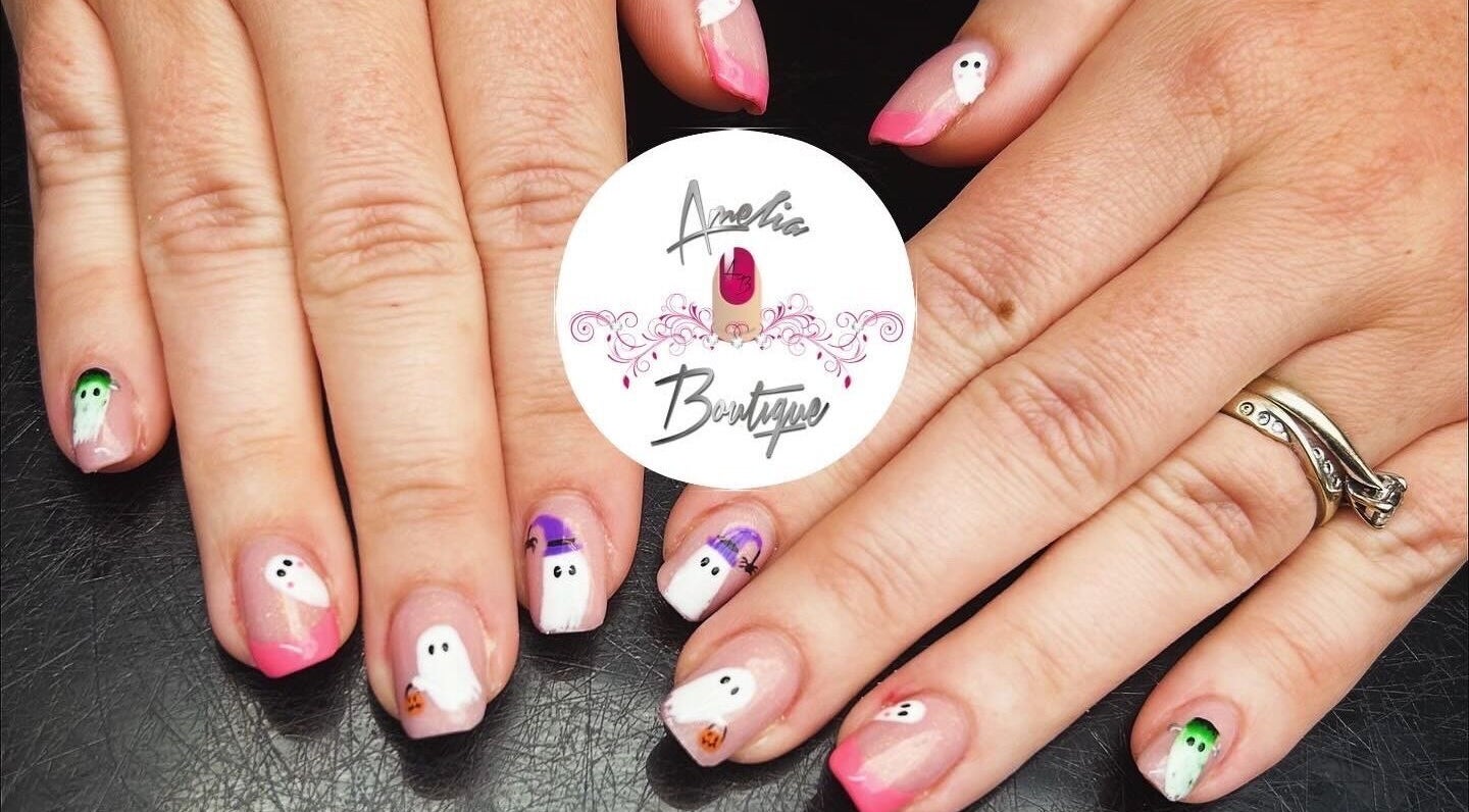 Stylish Halloween nail art at Amelia Boutique, Carlton In Lindrick, England, GB. Unique ghost designs showcased.