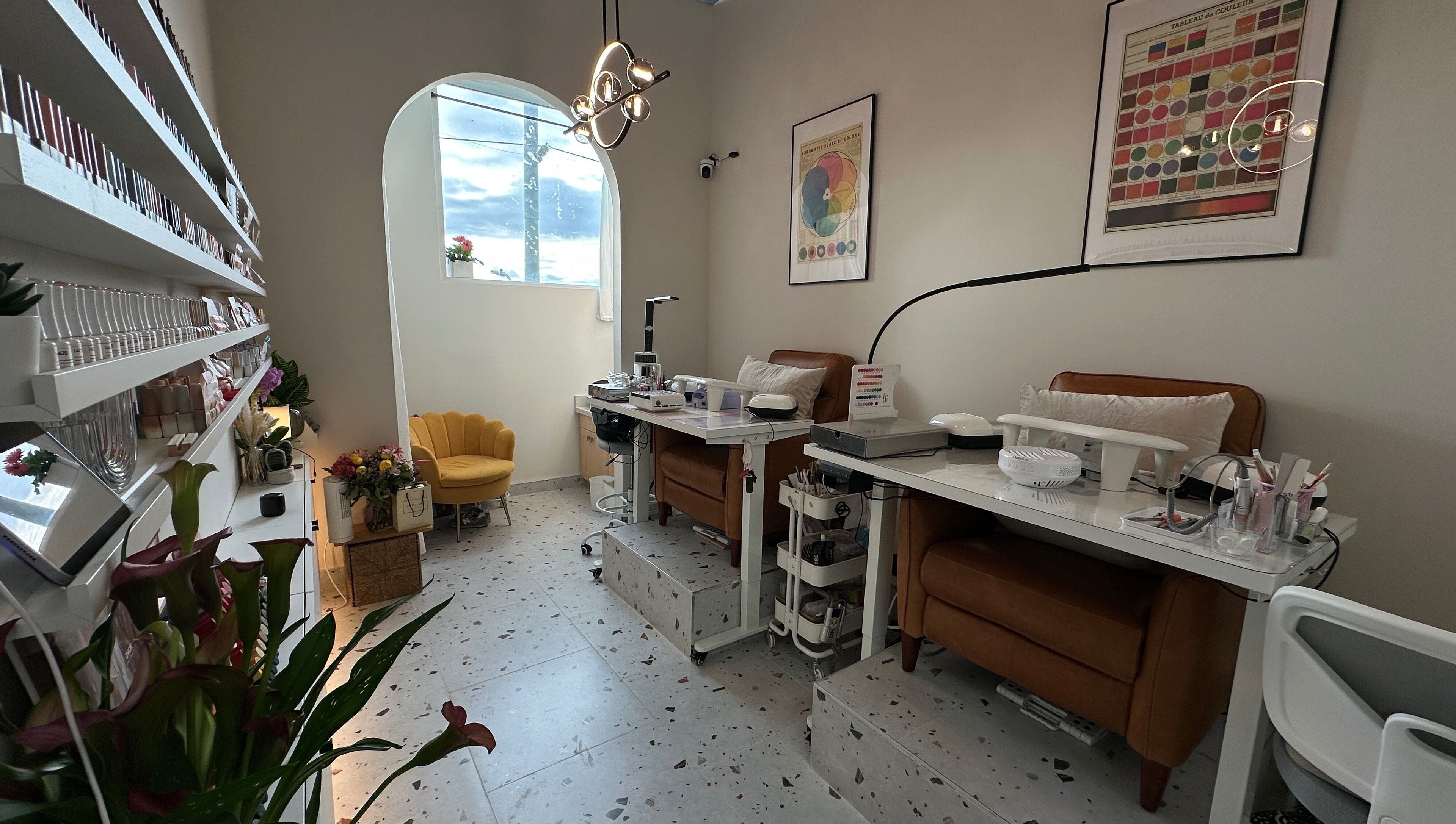 Jennie Nail Studio in Markham, Ontario, CA, showcasing elegant nail stations and colorful decor.