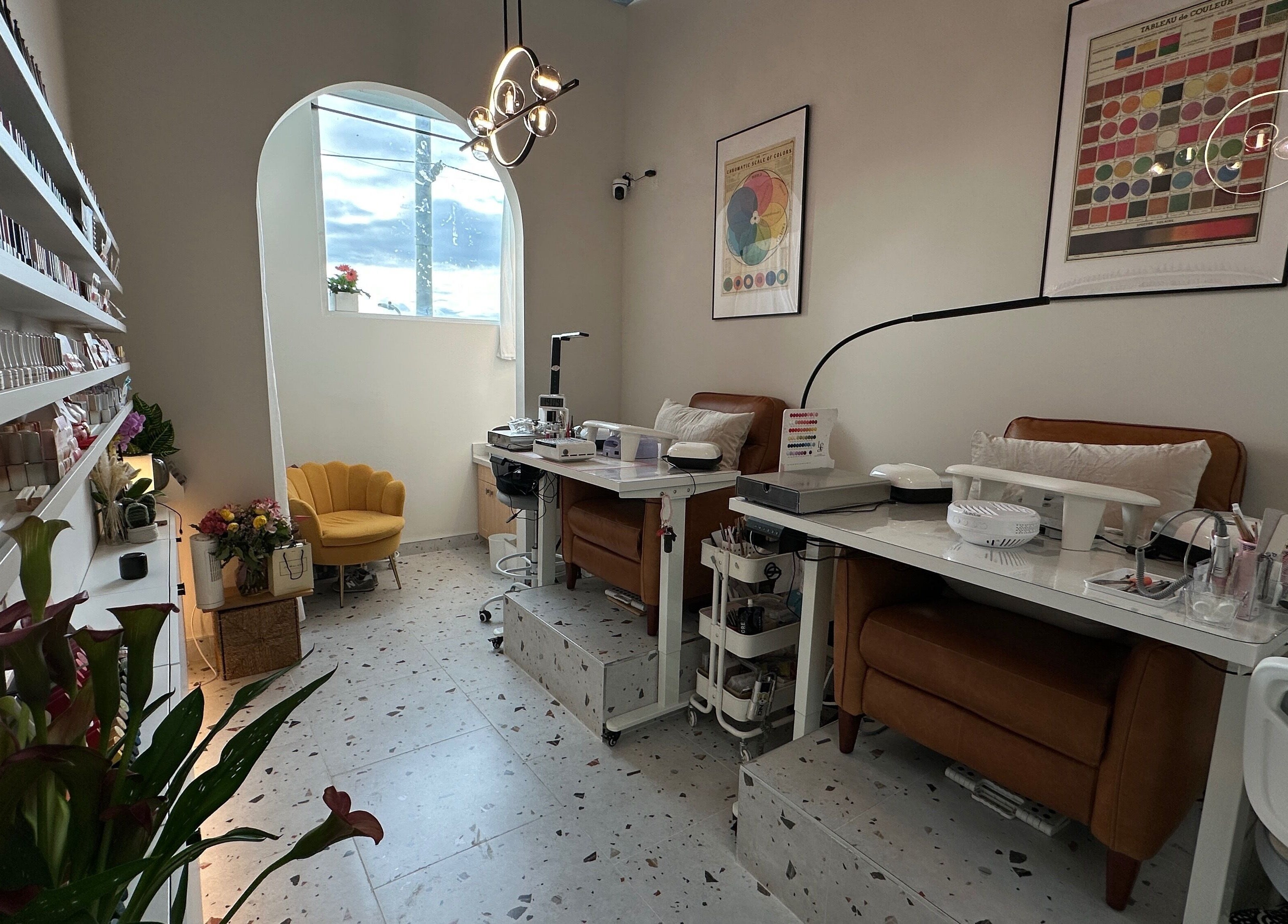 Jennie Nail Studio in Markham, Ontario, CA, showcasing elegant nail stations and colorful decor.