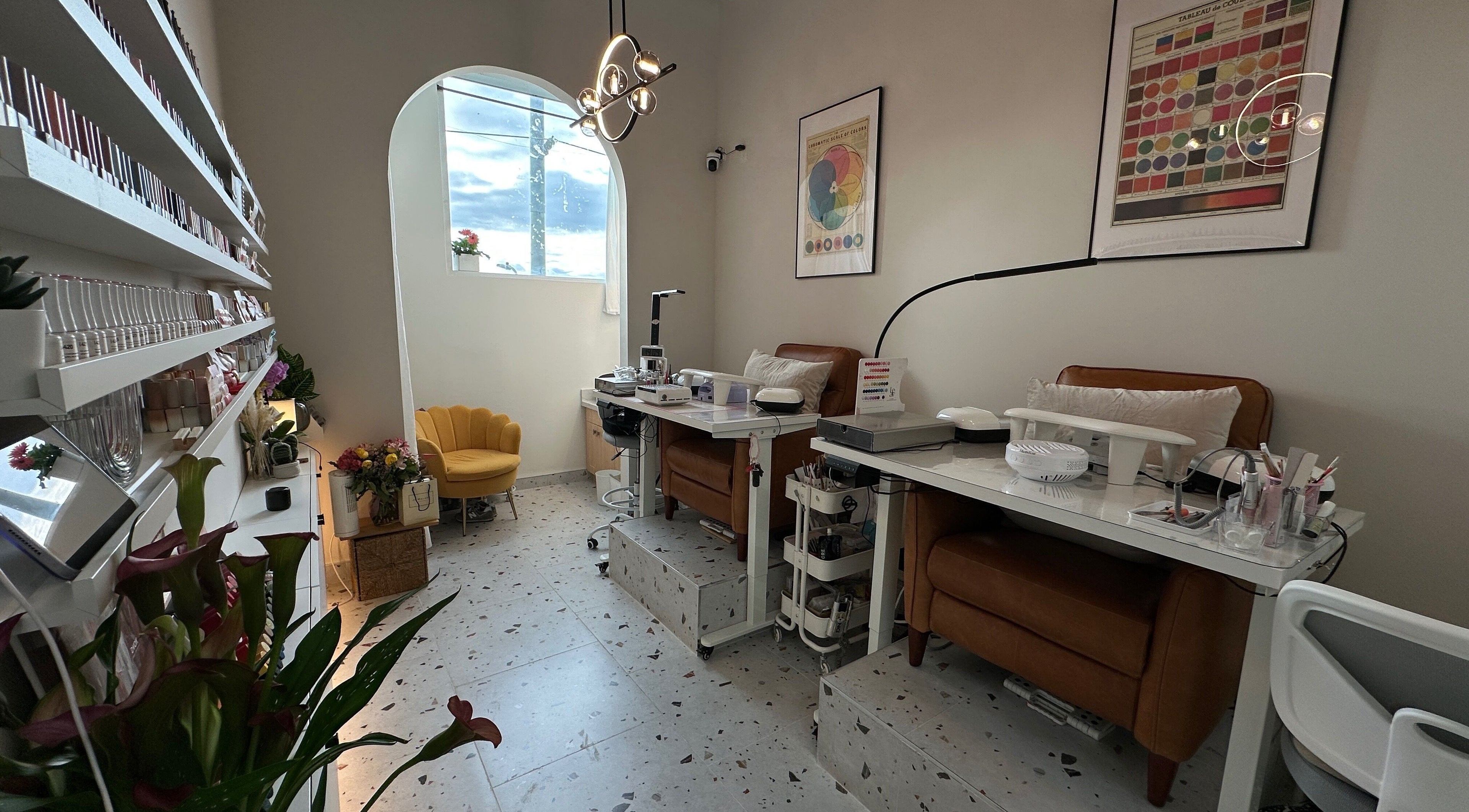 Jennie Nail Studio in Markham, Ontario, CA, showcasing elegant nail stations and colorful decor.