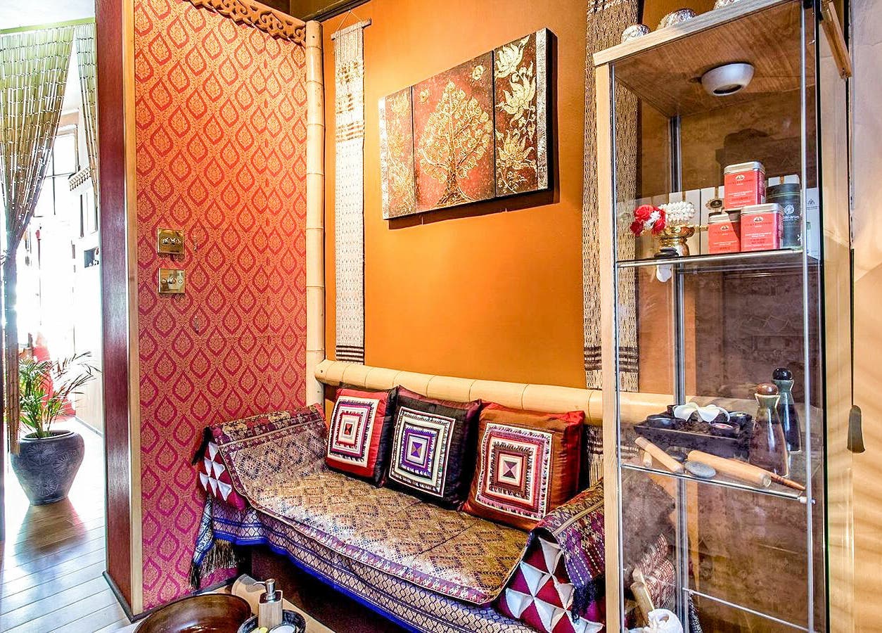 Inviting seating area at Wanida Thai Spa Ltd, London, England, GB showcasing traditional decor and calming ambiance.
