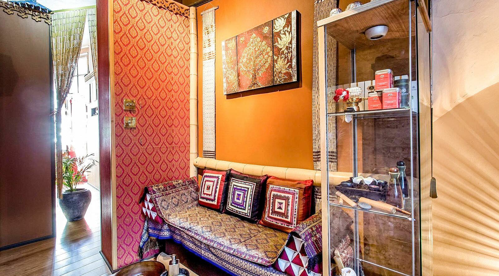 Inviting seating area at Wanida Thai Spa Ltd, London, England, GB showcasing traditional decor and calming ambiance.
