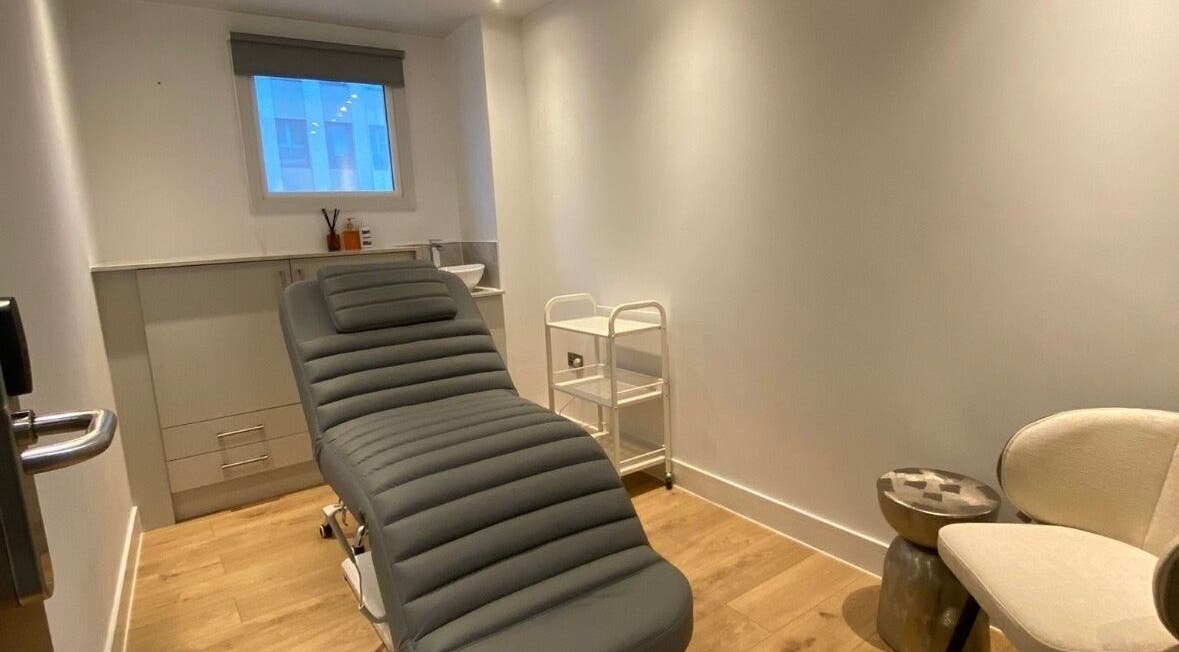 Relaxing treatment room at Brow Studio London, located in London, England, GB featuring a comfortable chair.