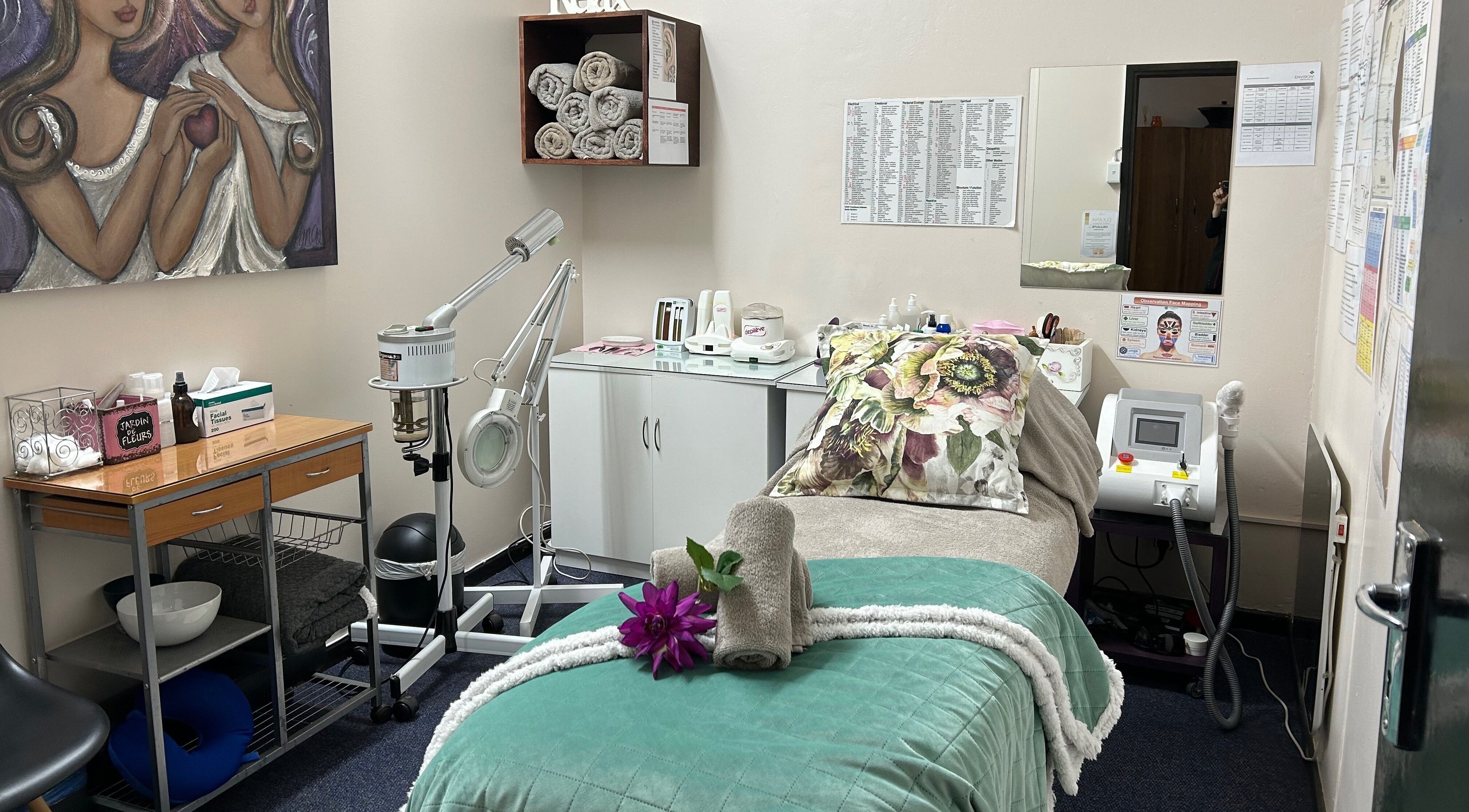 Relaxing spa room at Salon Elkana Health and Beauty, Vredendal, Western Cape, ZA with massage bed and equipment.