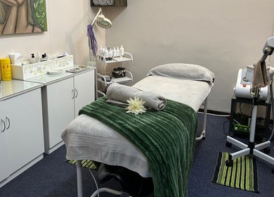 Relaxing treatment room at Salon Elkana Health and Beauty, Vredendal, Western Cape, ZA with massage bed.