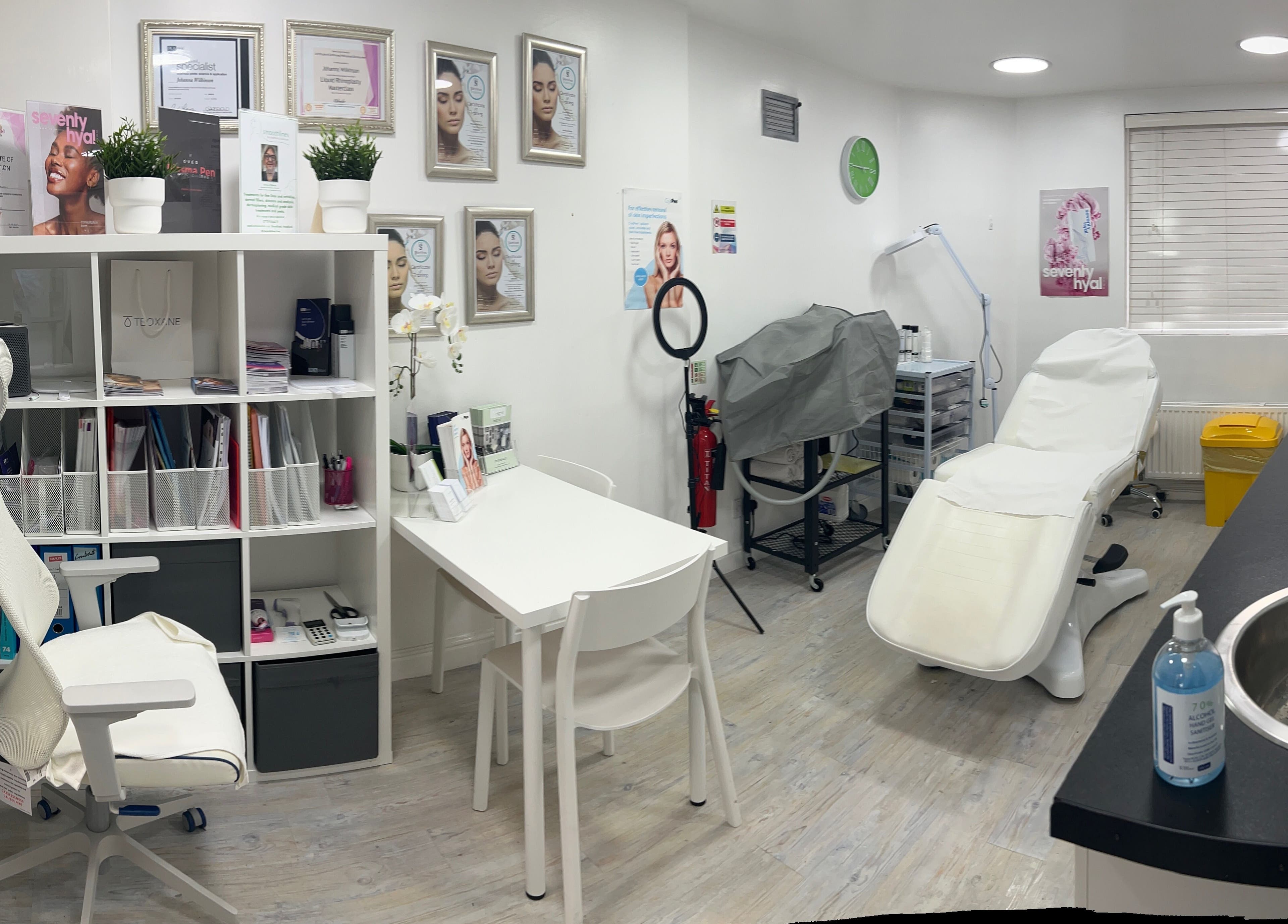 Modern treatment room at Smoothlines Facial Aesthetics, Stockport, England, GB, featuring sleek decor and equipment.