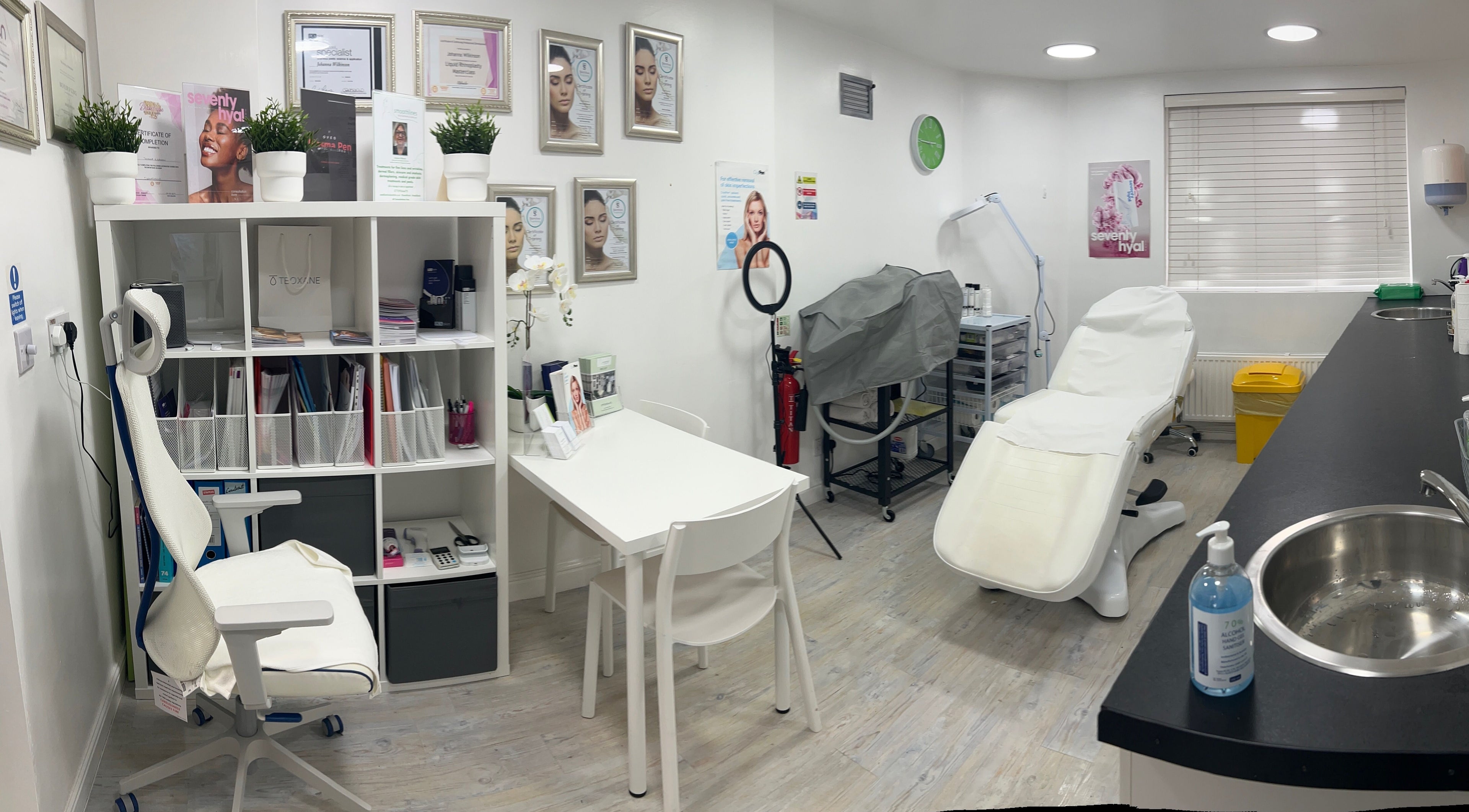 Modern treatment room at Smoothlines Facial Aesthetics, Stockport, England, GB, featuring sleek decor and equipment.