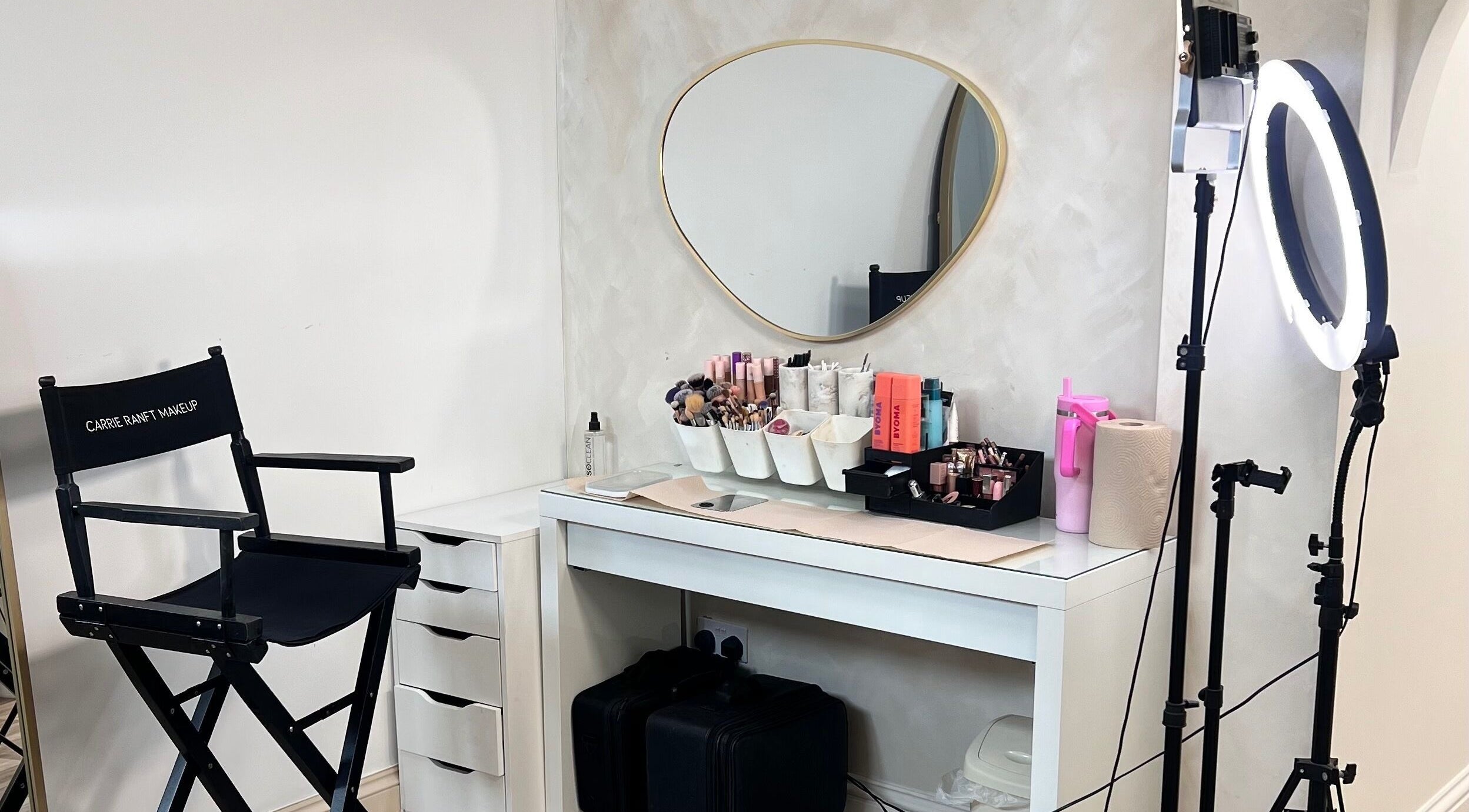 Makeup station with chair and mirror at Carrie Ranft Makeup in Worthing, England, GB.
