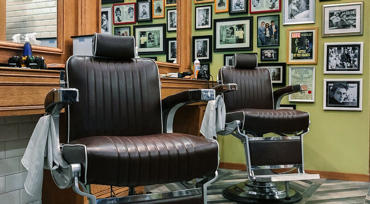 Classic barber chairs at Julian's Barbershop in Dubai, AE showcasing vintage style.
