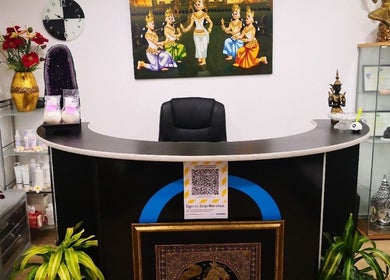 Welcoming reception area at Surin Thai Spa, Auckland, NZ with Thai decor and elegant furnishings.