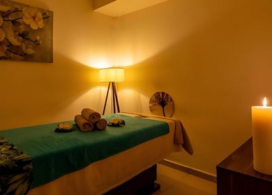Relaxing spa room at Musho Spa Wellness Center BEHU, Balıkesir, Balıkesir, TR, with candles and ambiance.