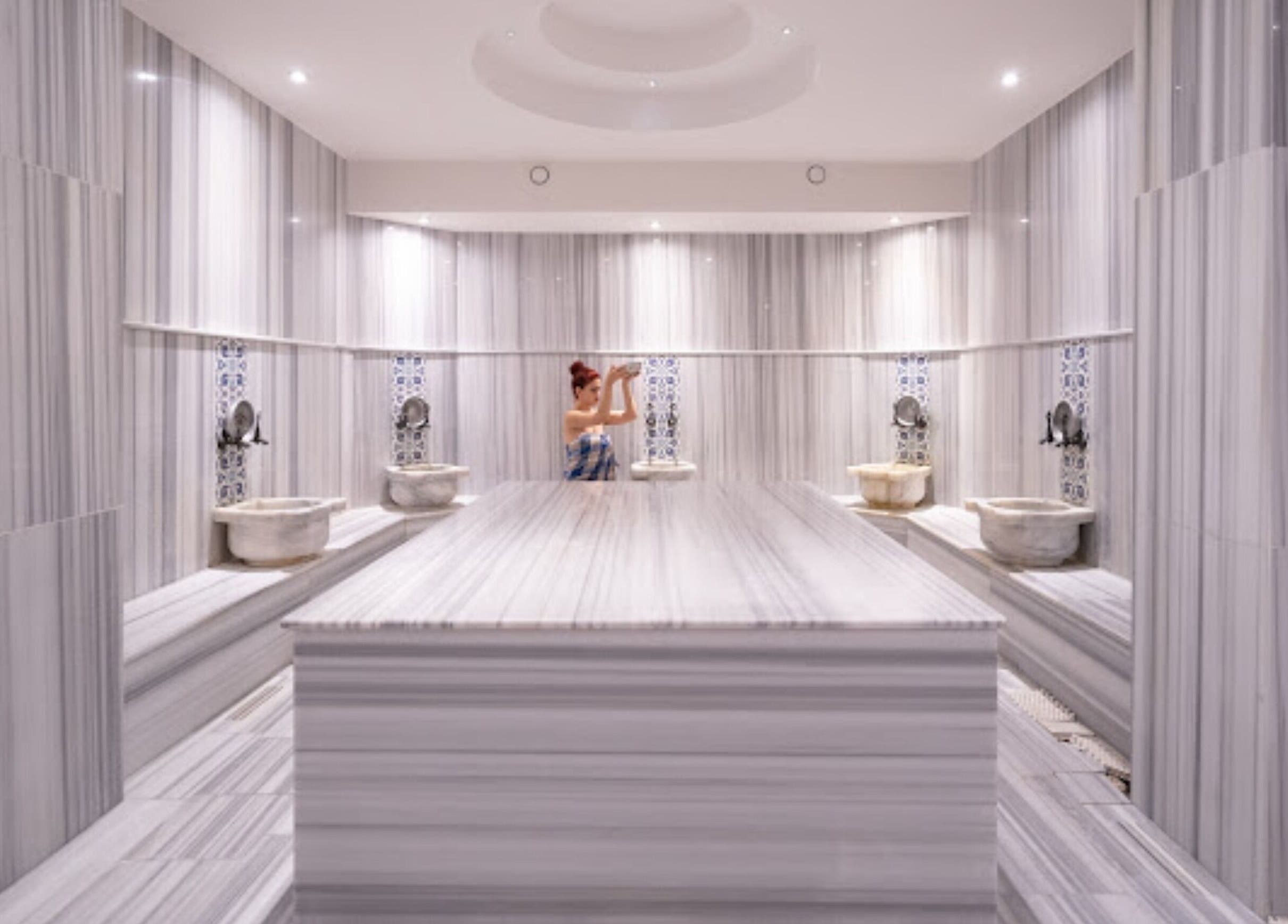 Luxurious hammam at Musho Spa Wellness Center BEHU in Balıkesir, Balıkesir, TR with elegant marble design.