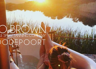 Relaxing bath at sunset outside Go Brown Roodepoort Studio, Roodepoort, Gauteng, ZA, enhancing tranquility.