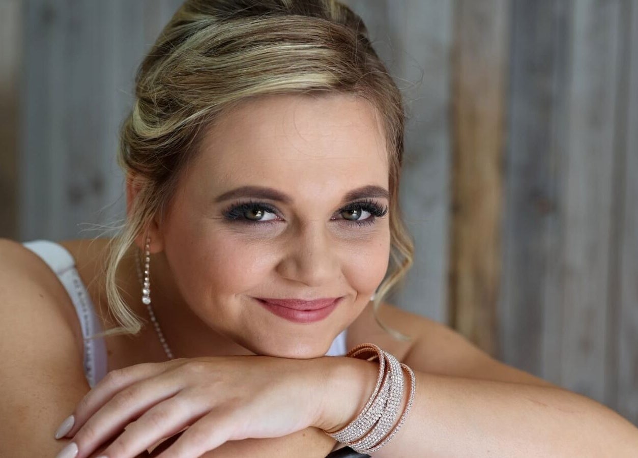 Smiling woman with elegant jewelry at Go Brown Mpumpalanga - Nelspruit, Mbombela, Mpumalanga, ZA.