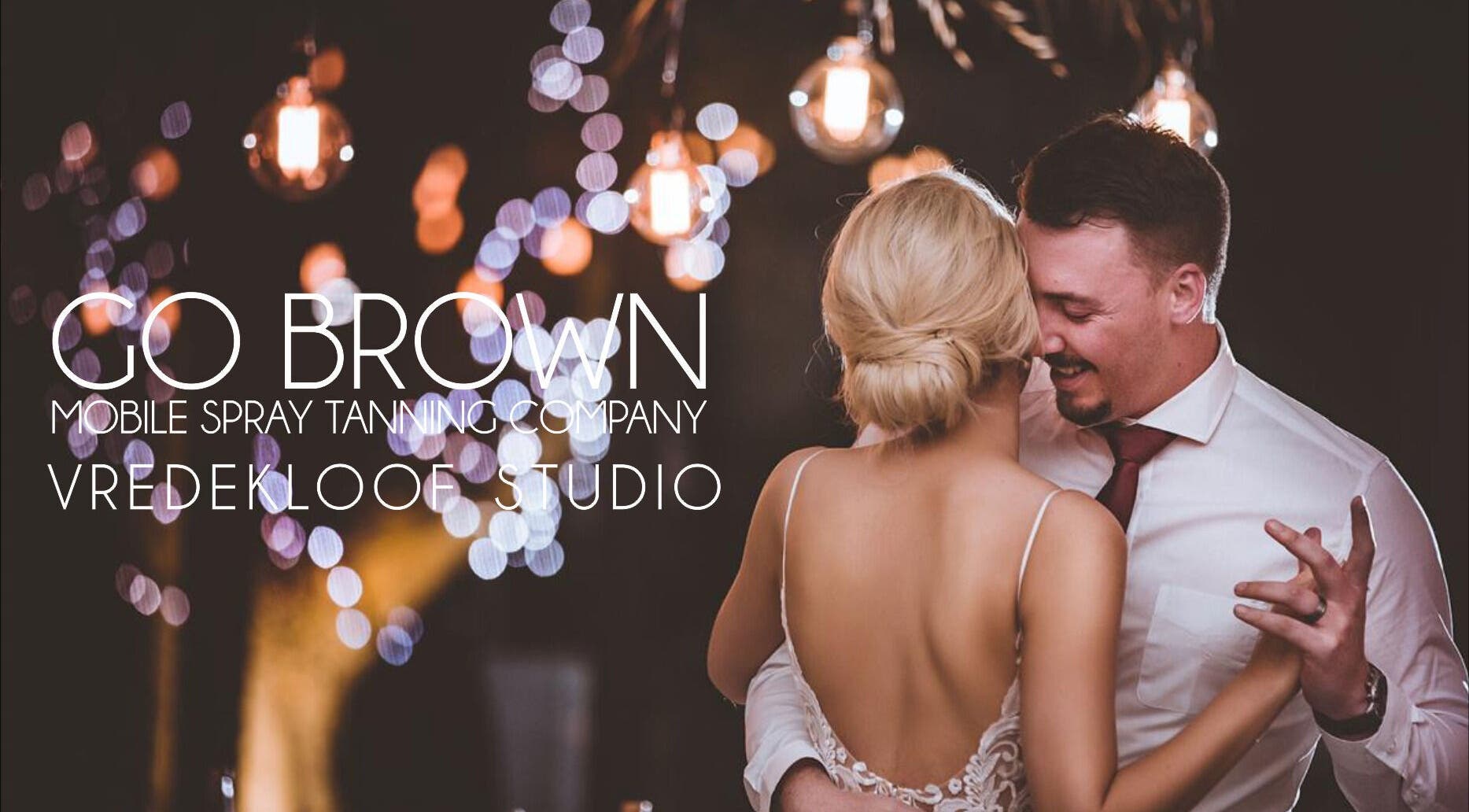 Couple dancing under lights at Go Brown Vredekloof Studio, Brackenfell, Western Cape, ZA.
