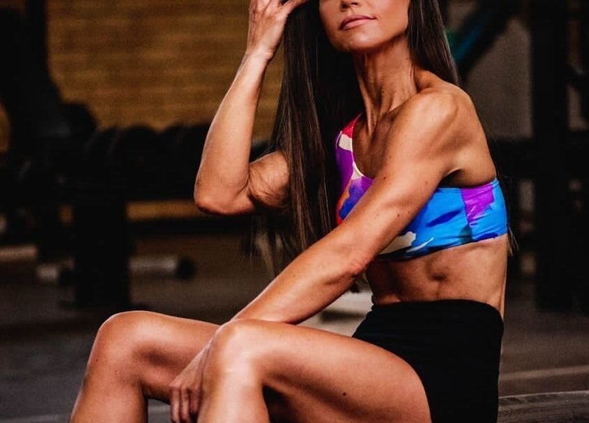 A woman in athletic wear poses confidently at Go Brown Krugersdorp Studio in Krugersdorp, Gauteng, ZA.