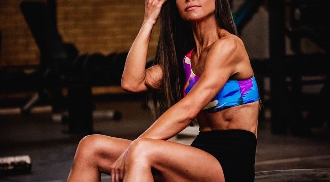 A woman in athletic wear poses confidently at Go Brown Krugersdorp Studio in Krugersdorp, Gauteng, ZA.