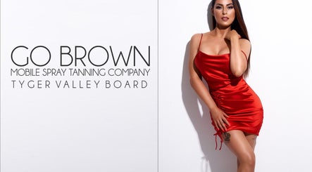 Elegant woman in red dress by Go Brown at Board 3 Tyger Valley & Surrounding Area, Uitzicht, ZA.