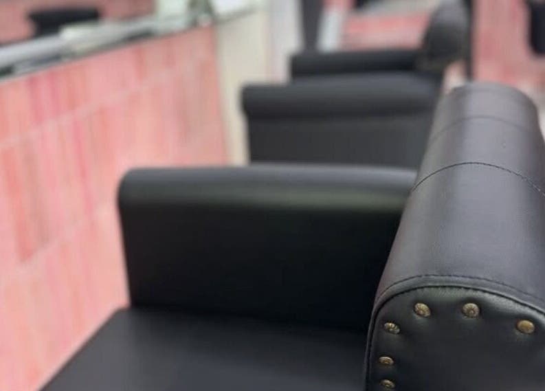 Stylish salon seating at That Glam Bar Goring by Sea, Worthing, England, GB. Contemporary design and comfort.