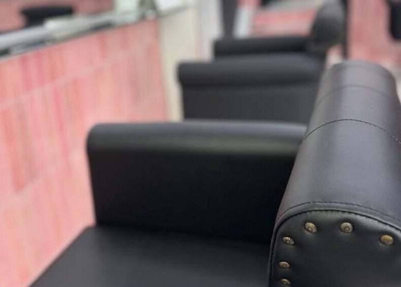 Stylish salon seating at That Glam Bar Goring by Sea, Worthing, England, GB. Contemporary design and comfort.