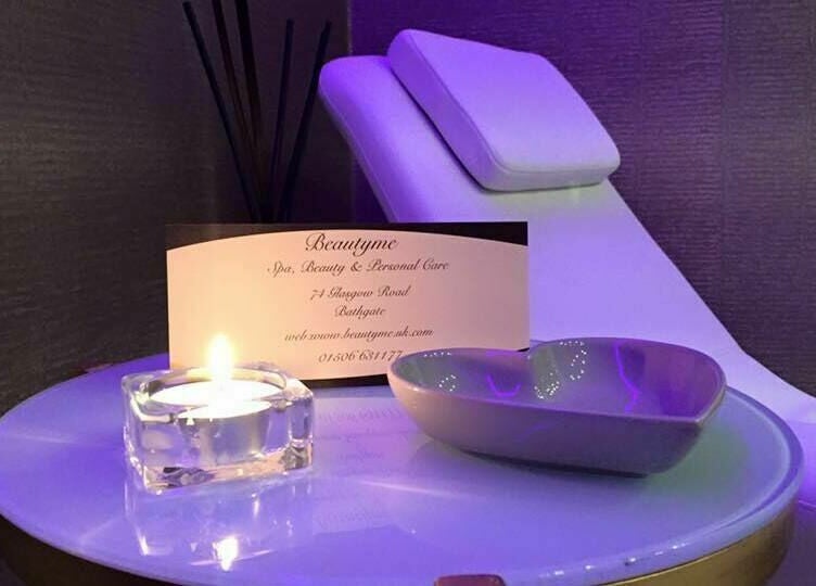 Relaxing candlelit spa setting at Beautyme in Bathgate, Scotland, GB, creating a serene atmosphere.