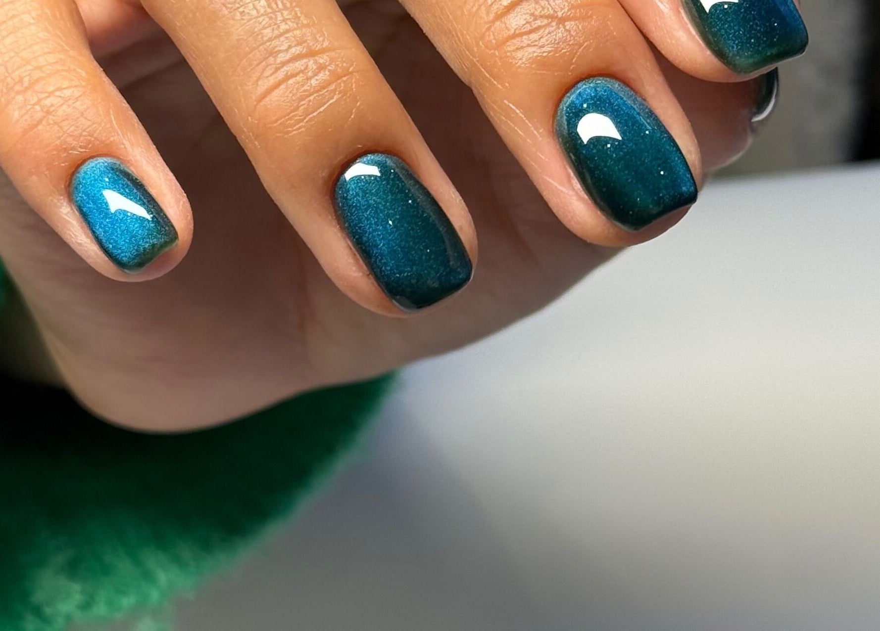 Elegant emerald nails at Zegna Nails UES, New York, New York, US showcasing professional manicure artistry.