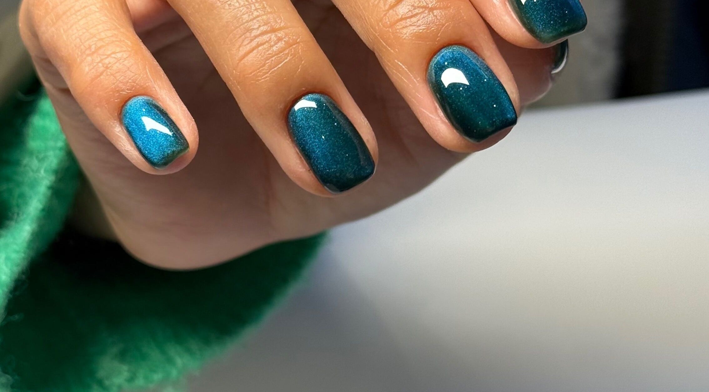 Elegant emerald nails at Zegna Nails UES, New York, New York, US showcasing professional manicure artistry.