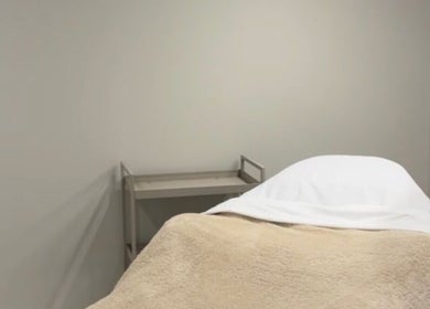 Calming treatment room at L.A Facial Aesthetics, Saltash, England, GB, featuring a comfortable, inviting spa bed.