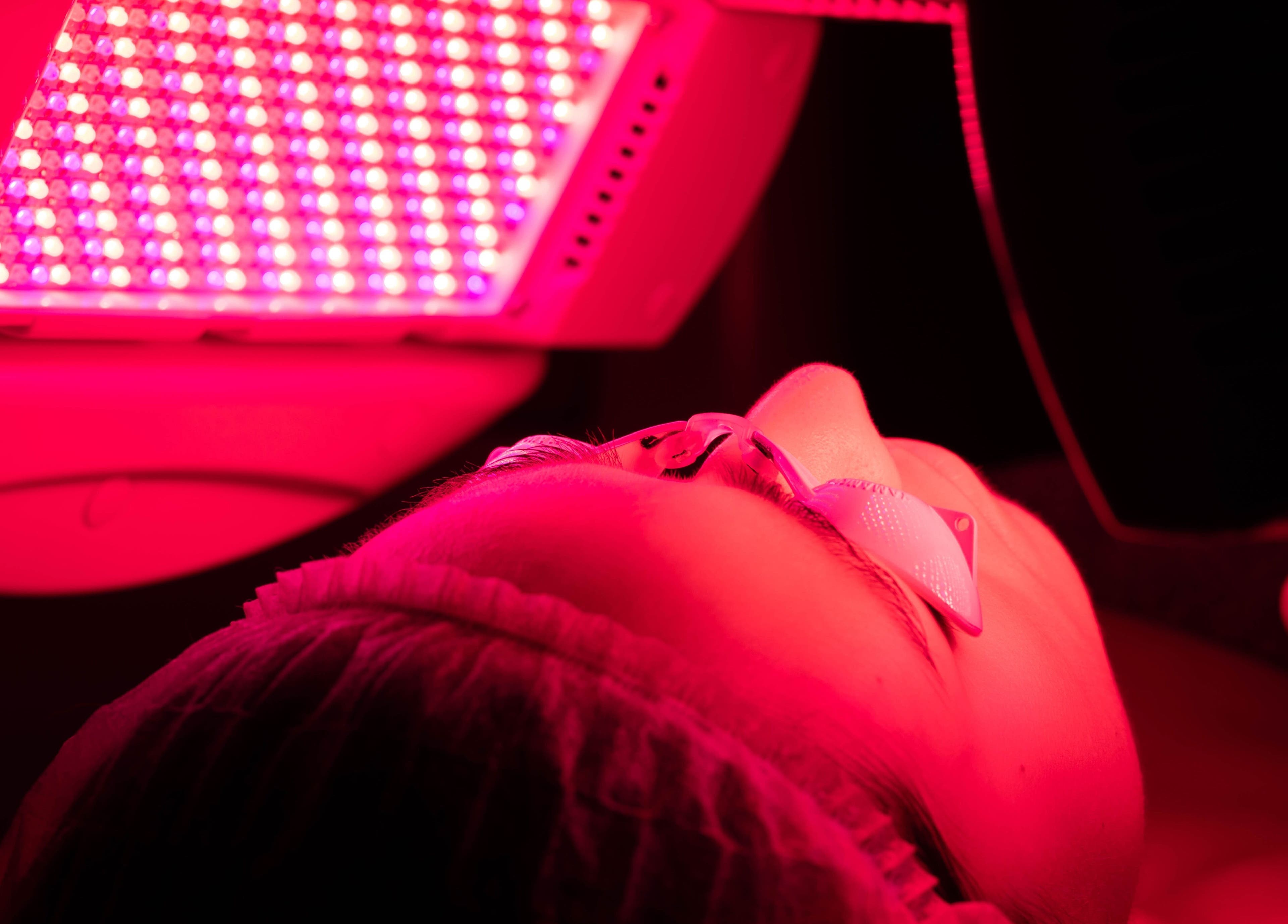 Red light therapy session at Meta Beauty in London, England, GB revitalizing skin under therapeutic glow.