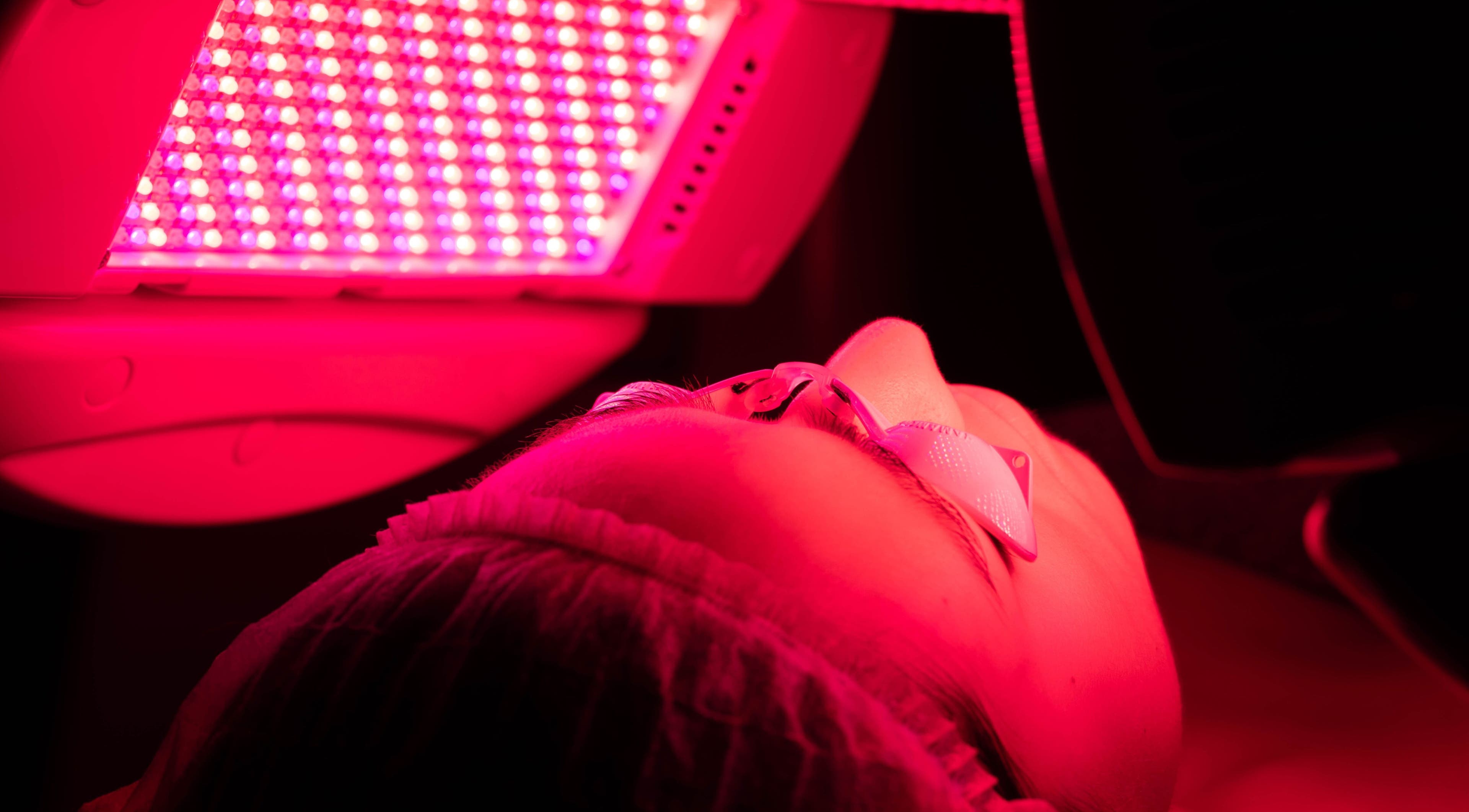 Red light therapy session at Meta Beauty in London, England, GB revitalizing skin under therapeutic glow.
