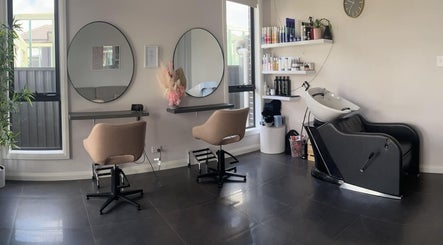 Modern styling chairs and mirrors at HBSL Hair by Stacey Lorraine in Box Hill, New South Wales, AU.