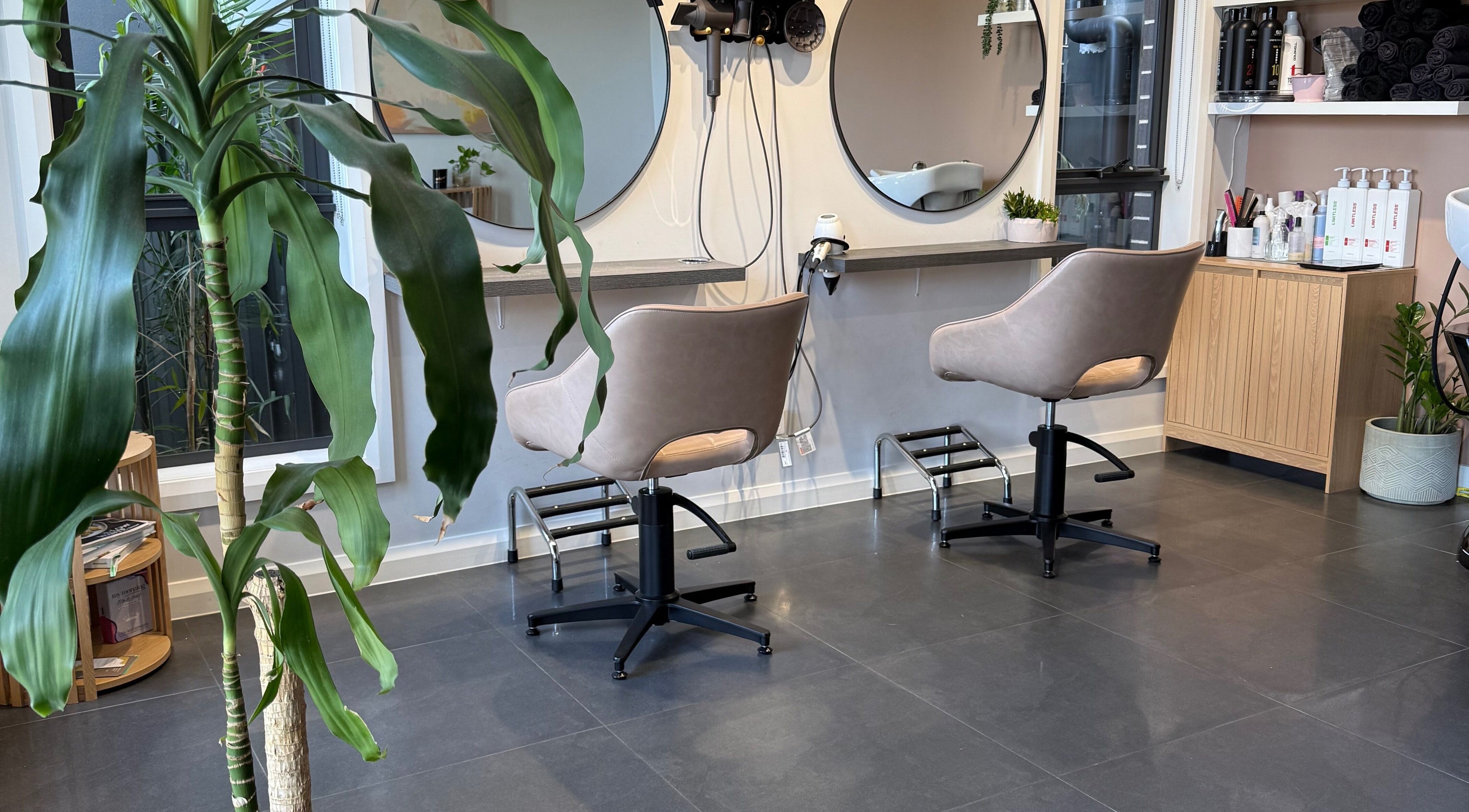 Modern salon chairs and mirrors at HBSL Hair by Stacey Lorraine, Box Hill, New South Wales, AU.
