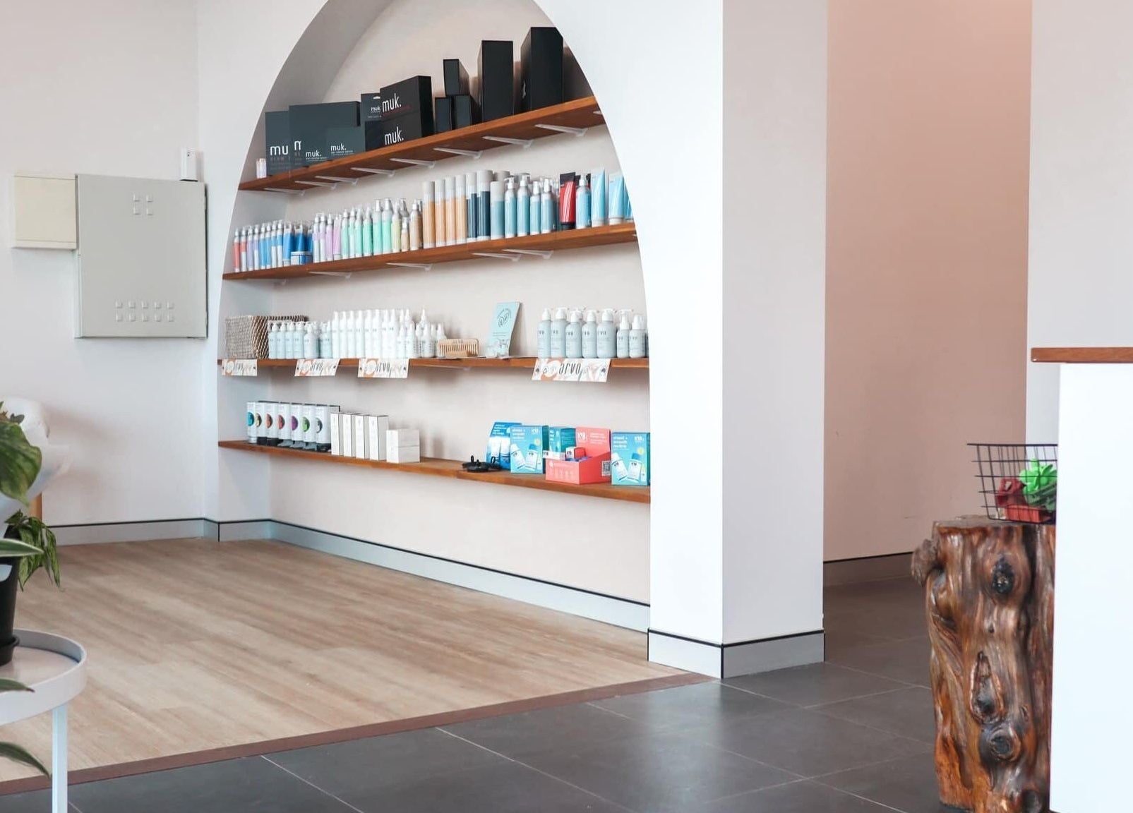 Stylish interior of Lily Me Red IPSWICH, North Ipswich, Queensland with shelves of beauty products.